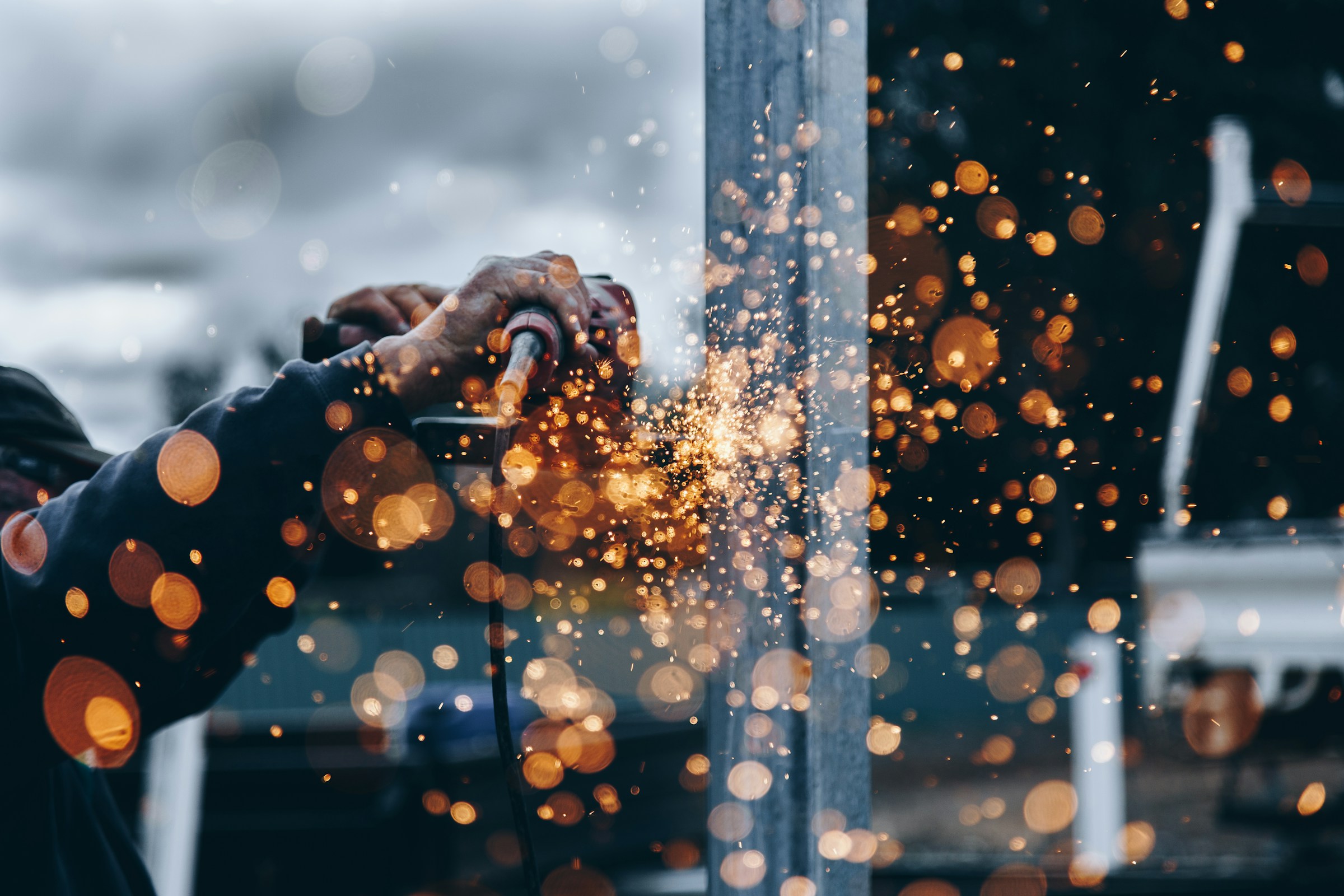 Metalworker fabricating an industrial steel assembly